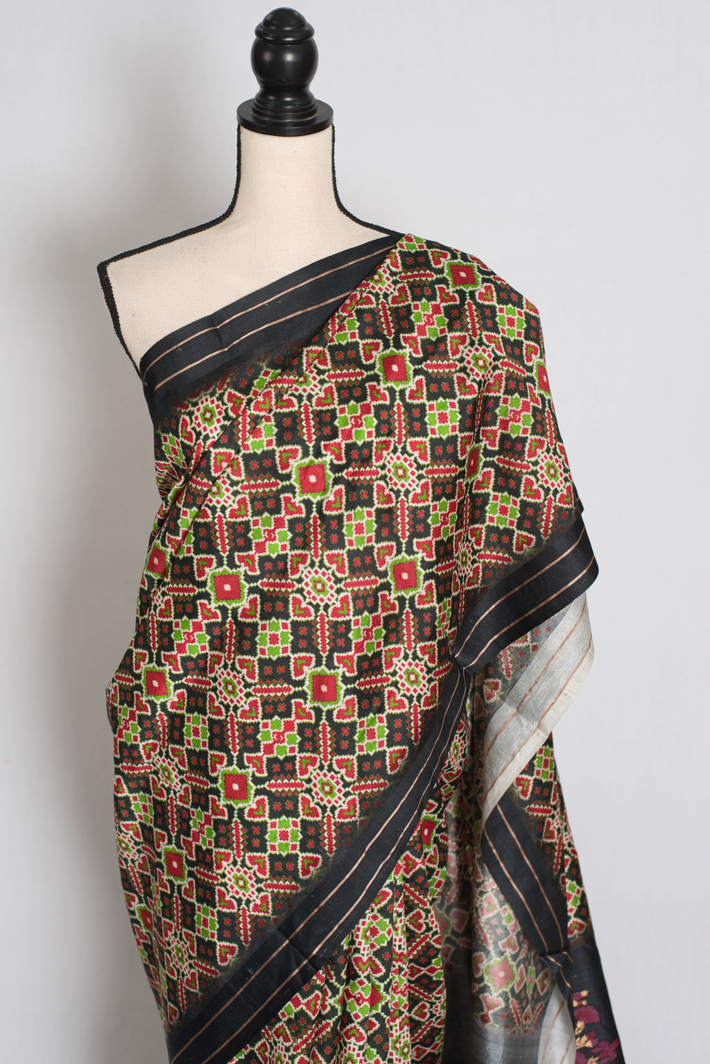 Kriti : Black and Gold Contemporary Ikkat Print Banarasi Katan Silk Saree