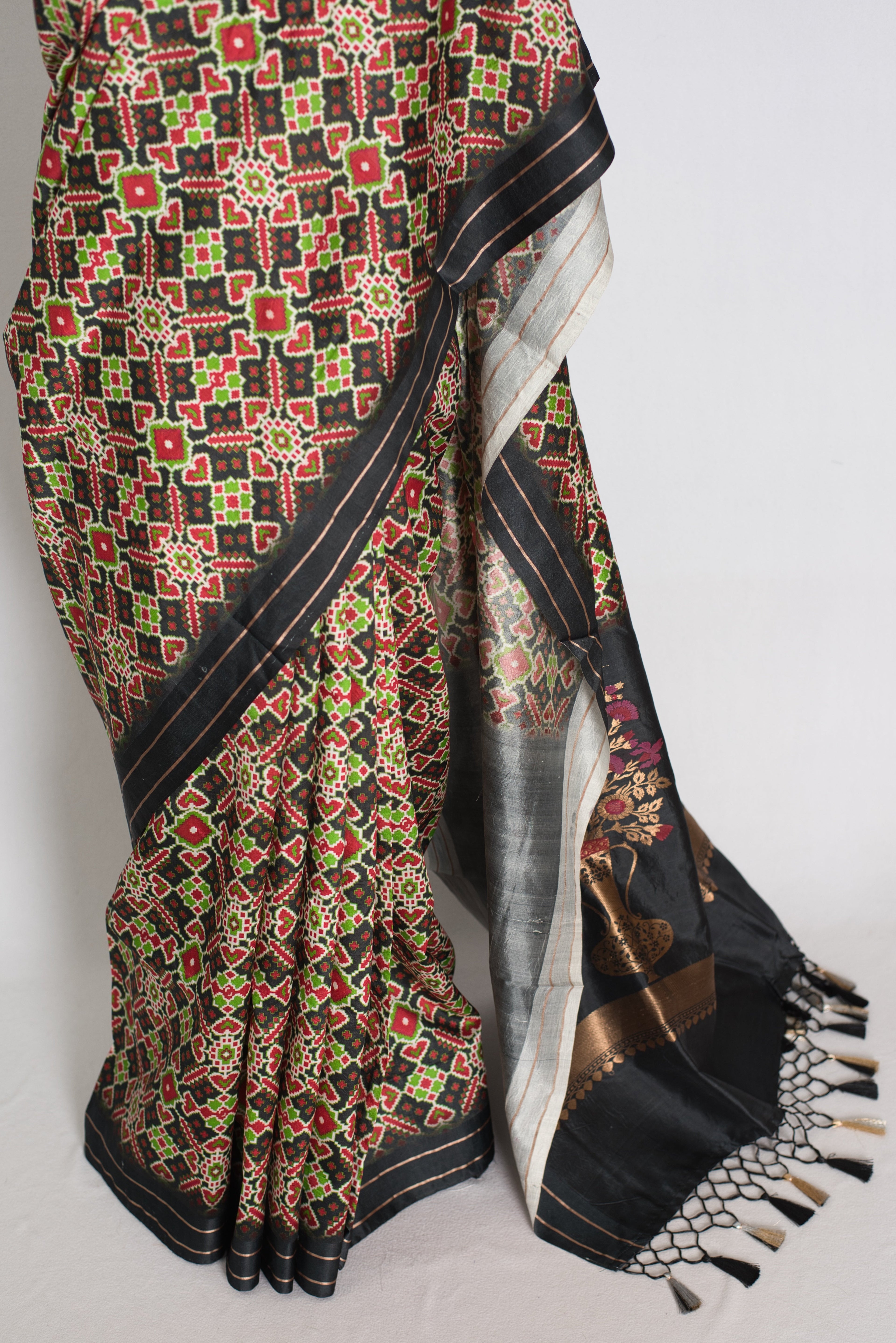 Kriti : Black and Gold Contemporary Ikkat Print Banarasi Katan Silk Saree