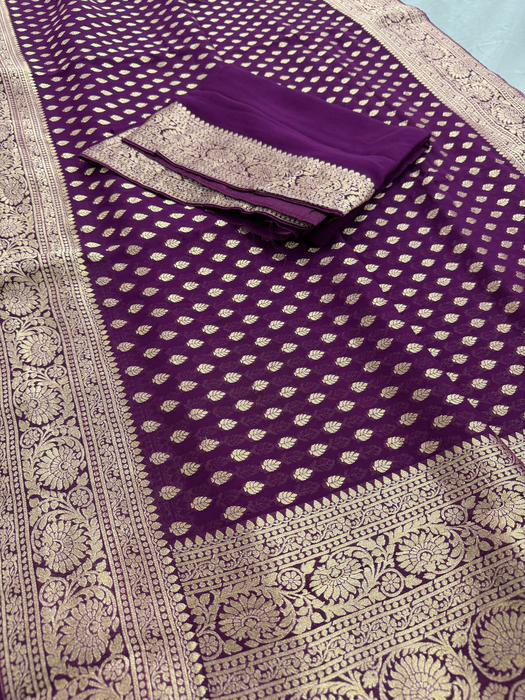 Trina : Wine and Gold Crepe Georgette Banarasi Saree