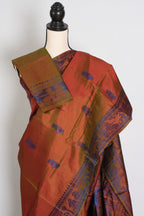 Nita | Brown and Blue Handwoven Baluchari Silk Saree with Blue Minakari Detail