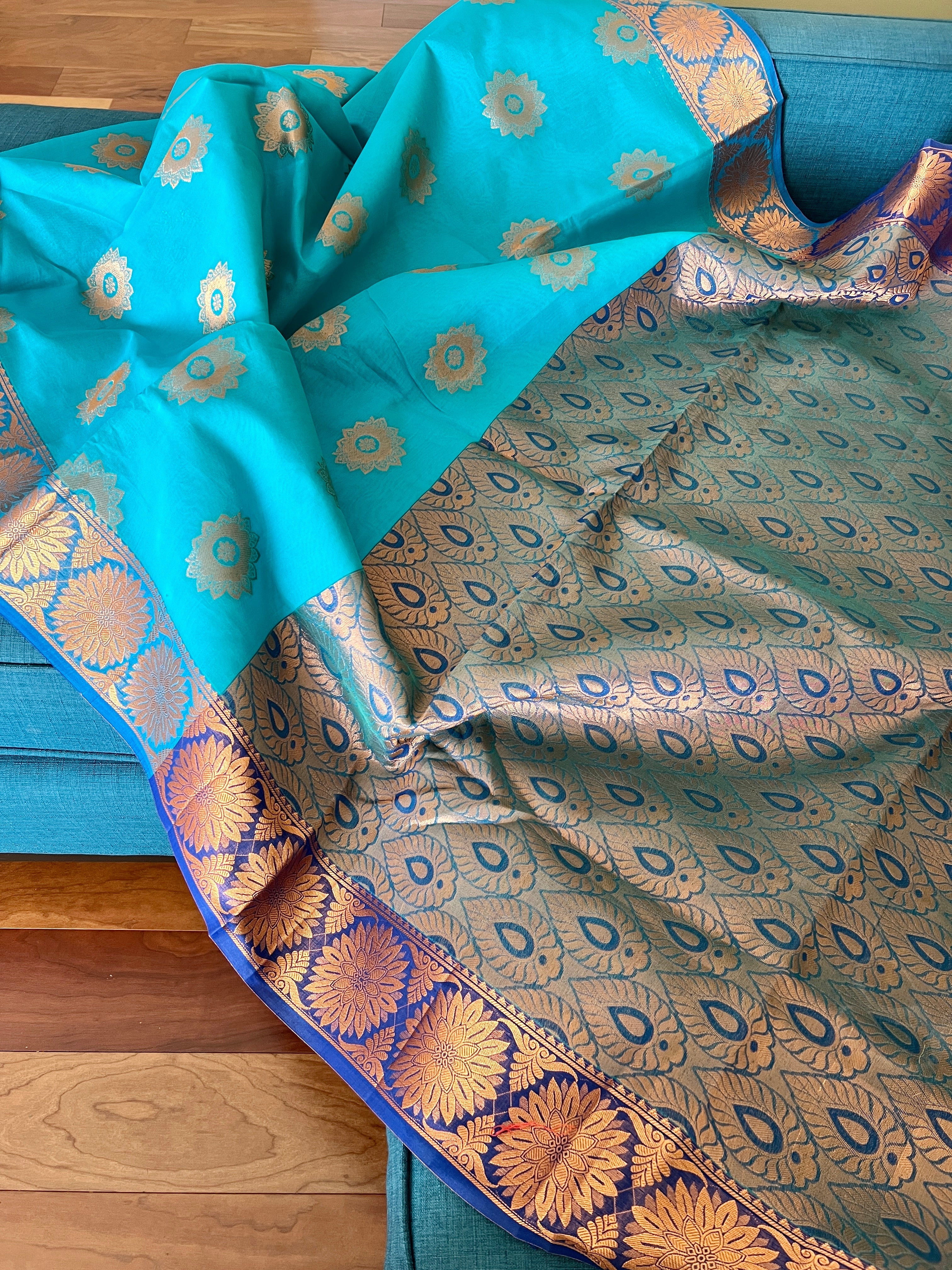 Turquoise Blue Blended Cotton Banarasi Saree with Gold Motif