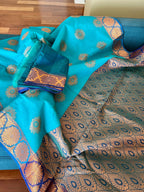 Turquoise Blue Blended Cotton Banarasi Saree with Gold Motif