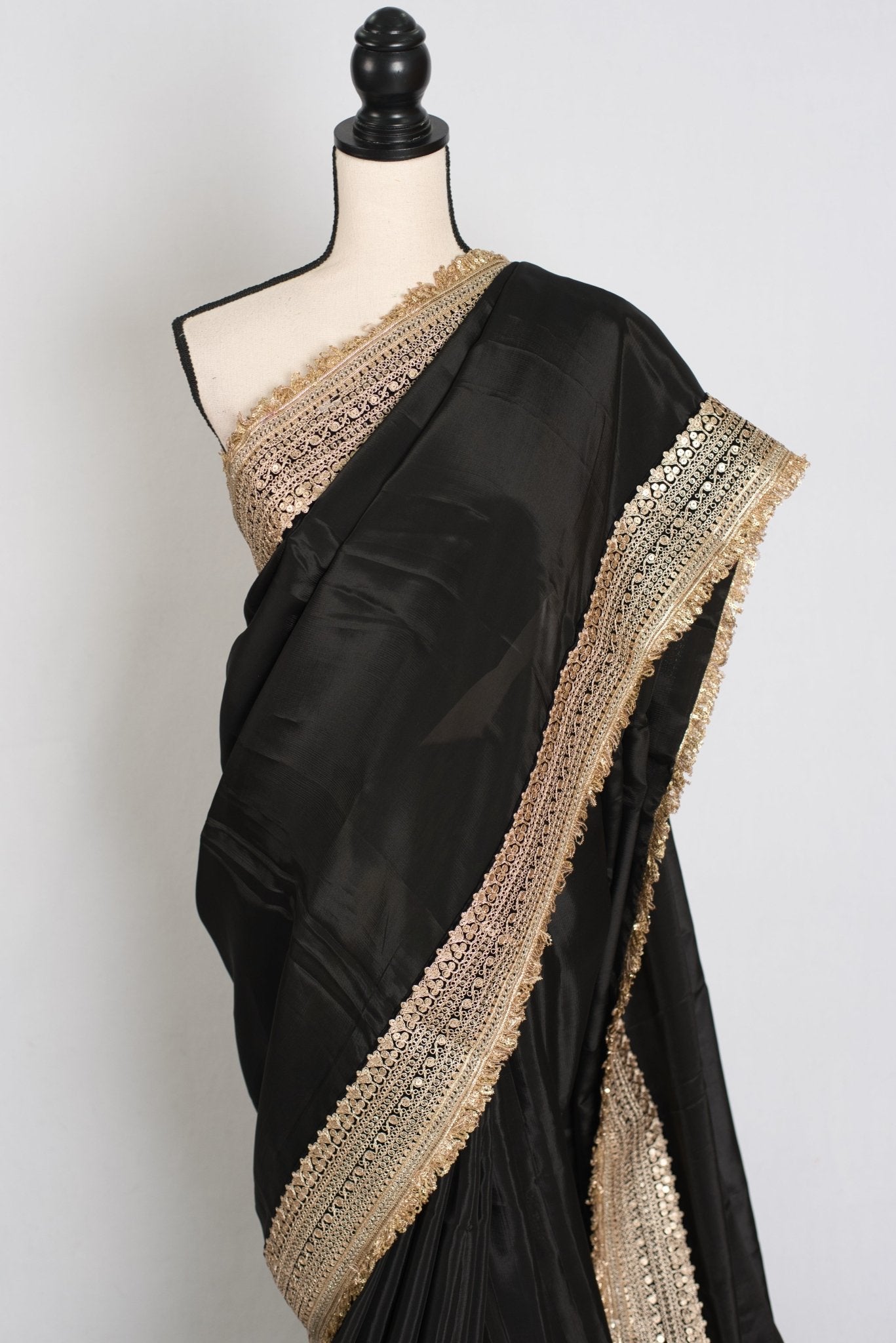 Arifa : Designer Semi Satin Black Partywear Saree with Patched Gold Border
