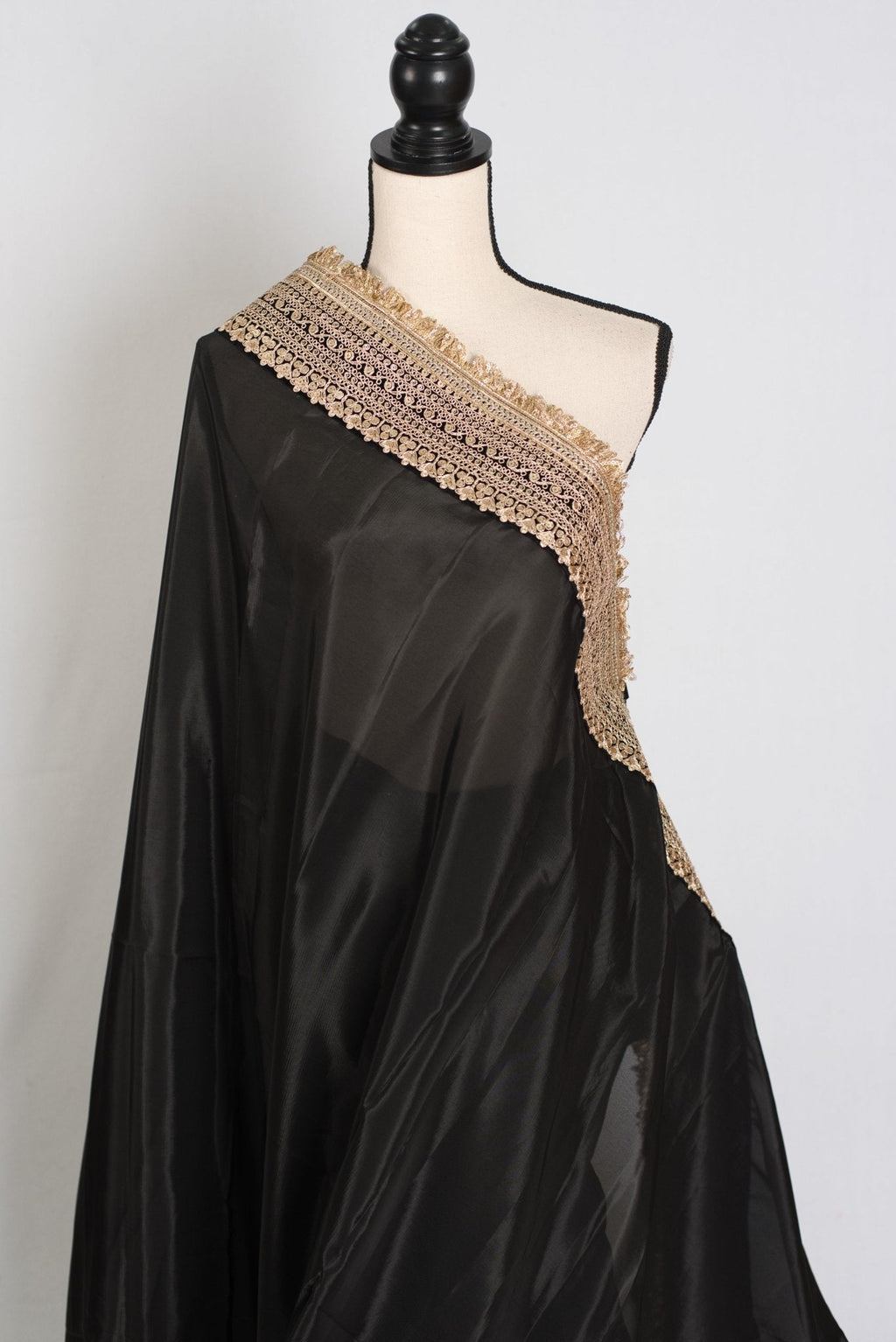 Arifa : Designer Semi Satin Black Partywear Saree with Patched Gold Border