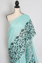 Dhriti | Turquoise Blue & Black Semi Kota Silk Saree | Artistic Floral Appliqué