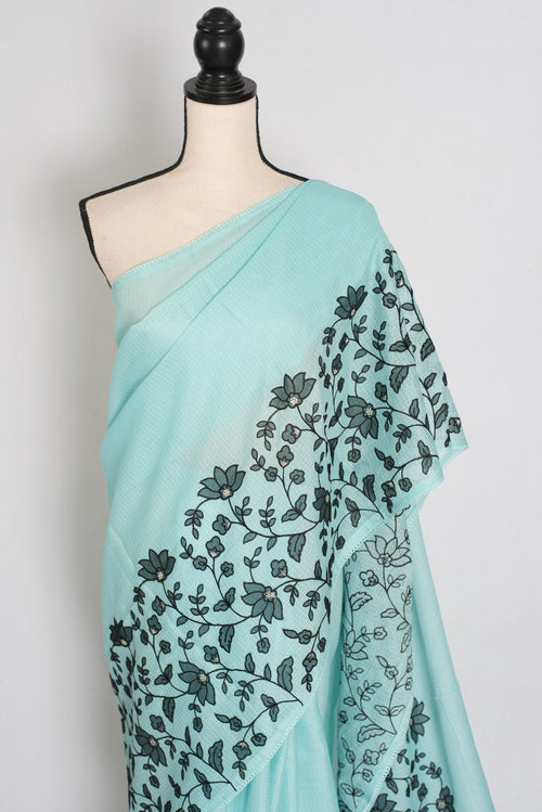 Dhriti | Turquoise Blue & Black Semi Kota Silk Saree | Artistic Floral Appliqué