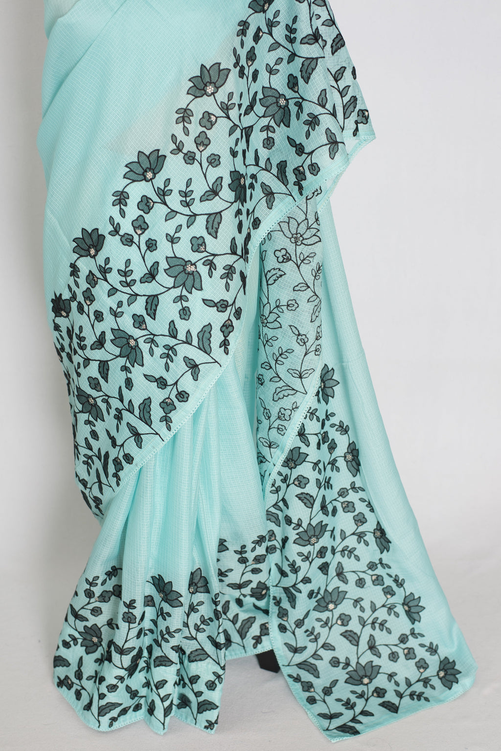 Dhriti | Turquoise Blue & Black Semi Kota Silk Saree | Artistic Floral Appliqué
