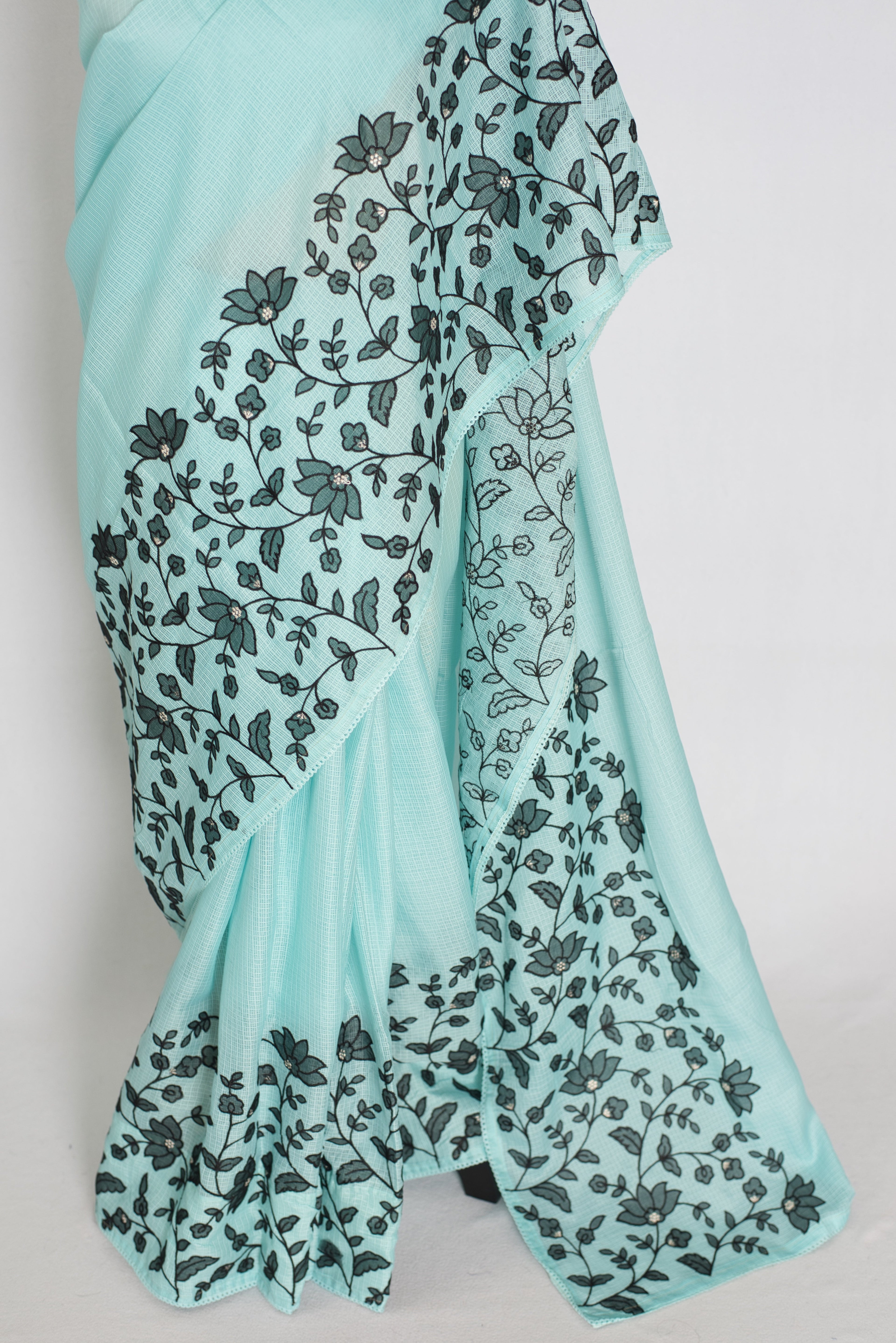 Dhriti | Turquoise Blue & Black Semi Kota Silk Saree | Artistic Floral Appliqué