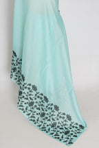 Dhriti | Turquoise Blue & Black Semi Kota Silk Saree | Artistic Floral Appliqué