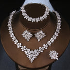 The Dazzling Set Is Handcrafted With Copper And Set With Zircon Stones.