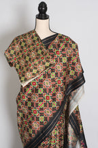 Kriti : Black and Gold Contemporary Ikkat Print Banarasi Katan Silk Saree