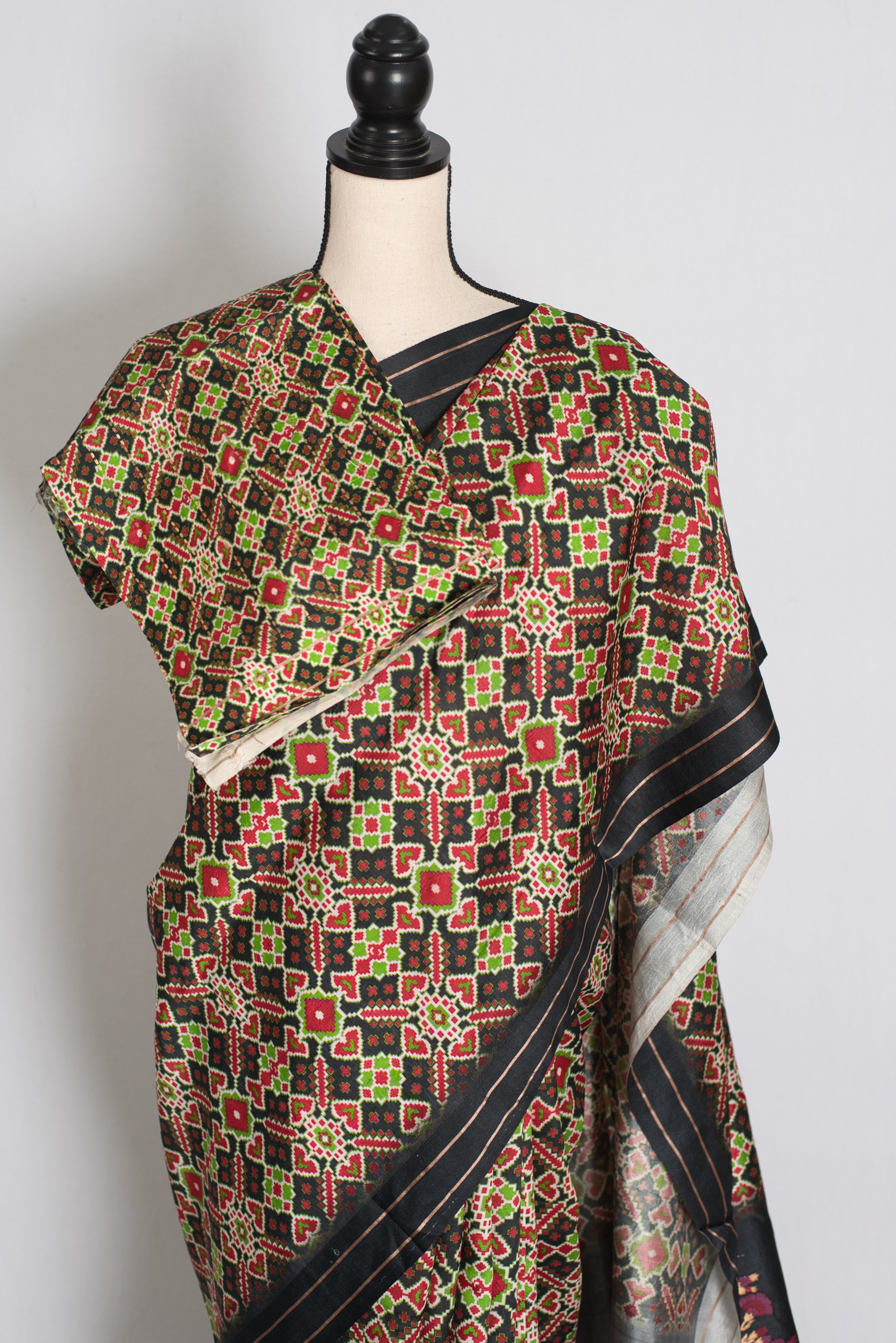 Kriti : Black and Gold Contemporary Ikkat Print Banarasi Katan Silk Saree