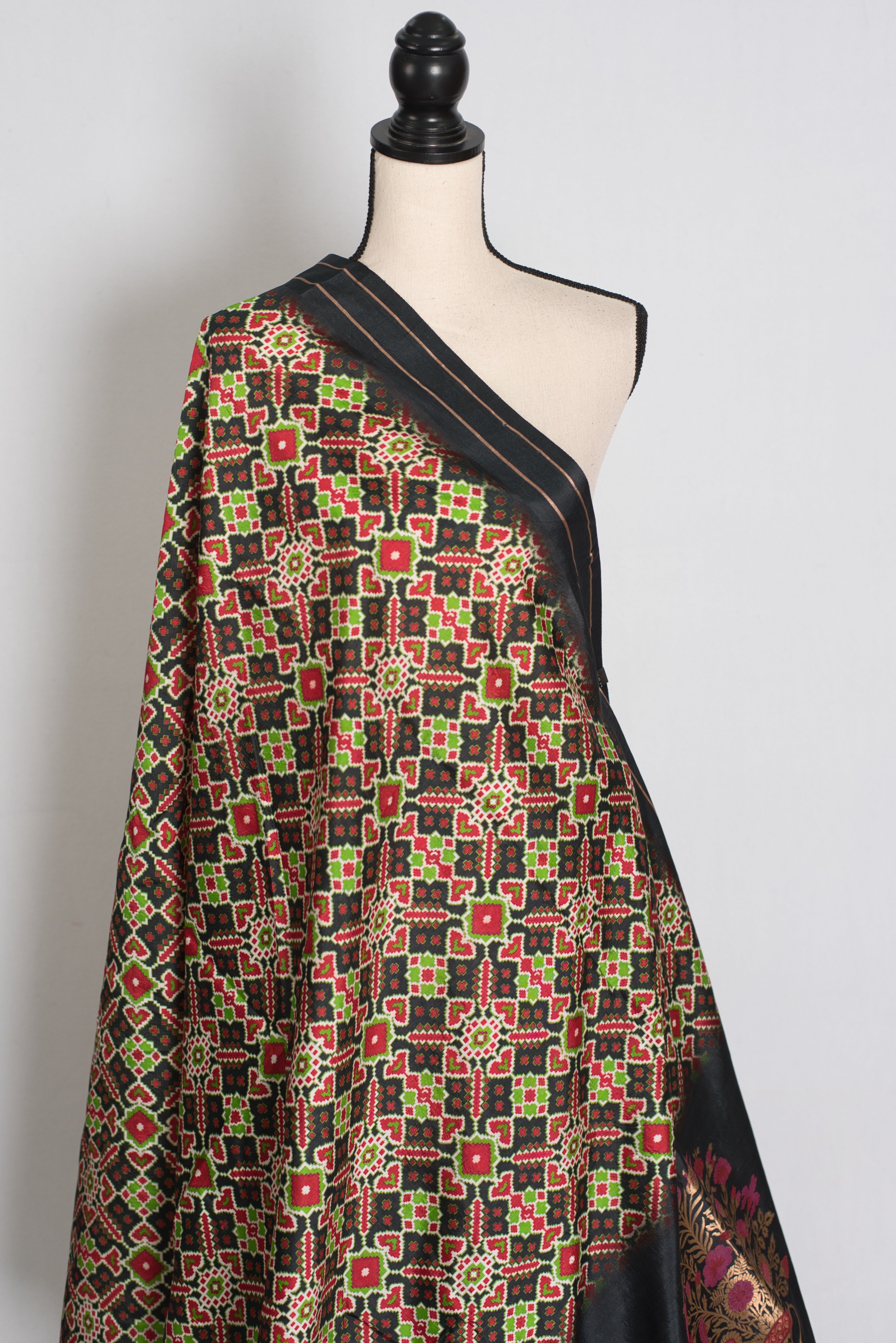 Kriti : Black and Gold Contemporary Ikkat Print Banarasi Katan Silk Saree