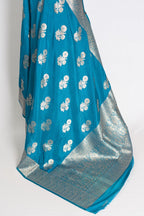 Kalyani : Turquoise Blue Semi Crepe Banarasi Saree with Silver Zari