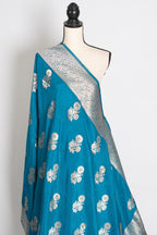 Kalyani : Turquoise Blue Semi Crepe Banarasi Saree with Silver Zari