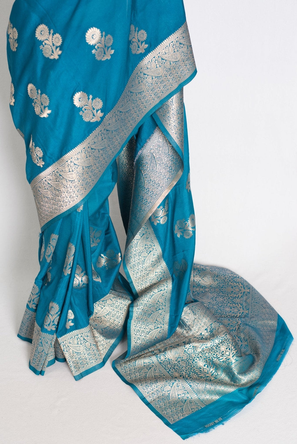 Kalyani : Turquoise Blue Semi Crepe Banarasi Saree with Silver Zari