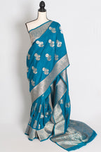 Kalyani : Turquoise Blue Semi Crepe Banarasi Saree with Silver Zari
