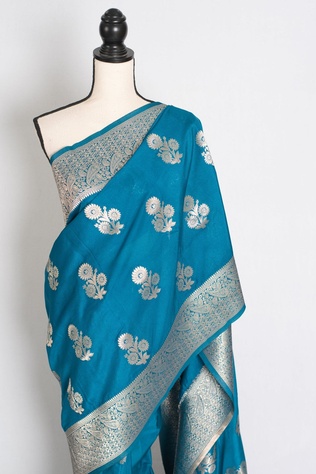 Kalyani : Turquoise Blue Semi Crepe Banarasi Saree with Silver Zari