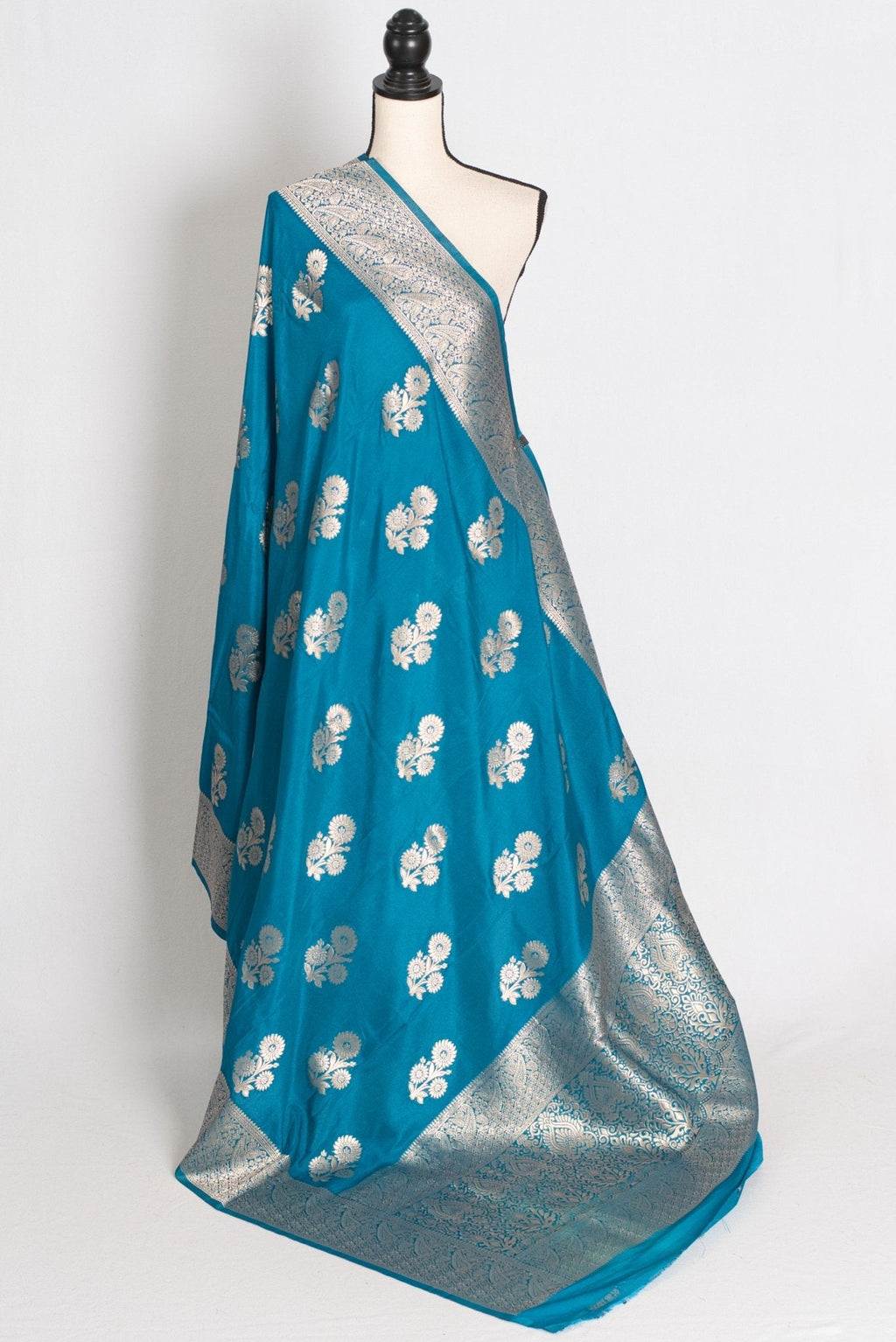 Kalyani : Turquoise Blue Semi Crepe Banarasi Saree with Silver Zari