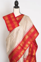 Mira: White and Brown Micro Checks Gadwal Silk Saree with Rich Red Zari Border