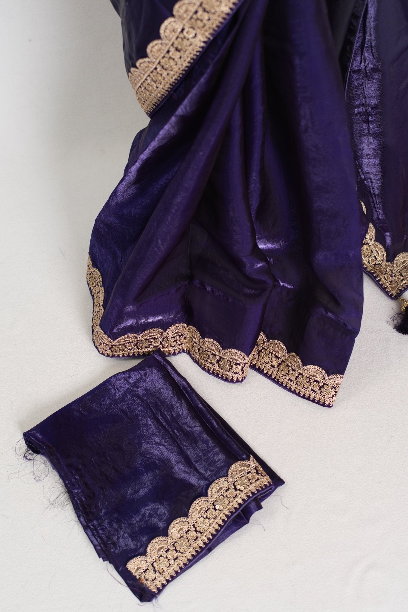 Nadia : Designer Glass Tissue Purple Partywear Saree with Patched Golden Border