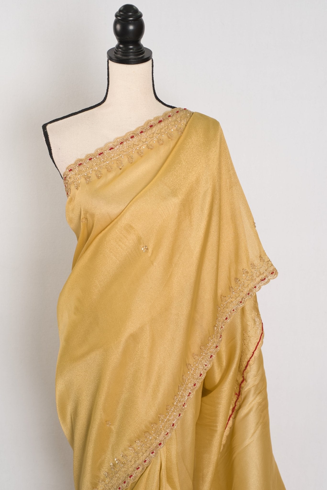 Nagma | Soft Tissue Gold Designer Saree with Hand Embroidery Border