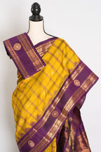Nandini: Yellow and Purple Checks Handwoven Gadwal Silk Saree with Golden Zari