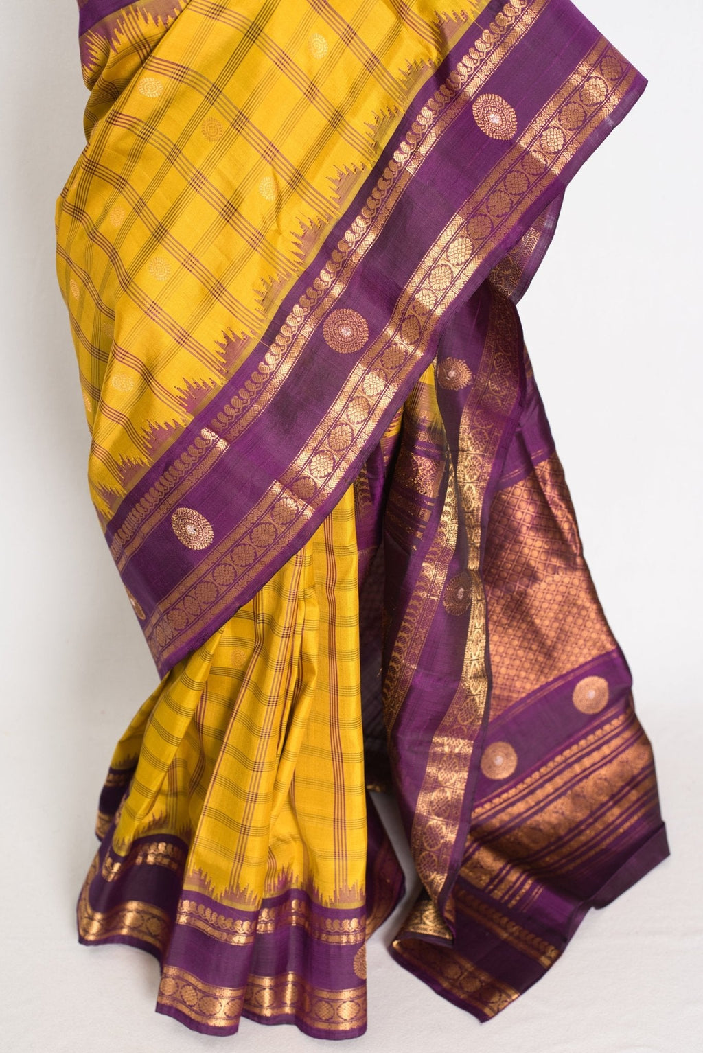 Nandini: Yellow and Purple Checks Handwoven Gadwal Silk Saree with Golden Zari