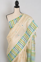 Rini: Cream Tussar Silk Saree with Blue & Green Motifs | Silk Mark Certified