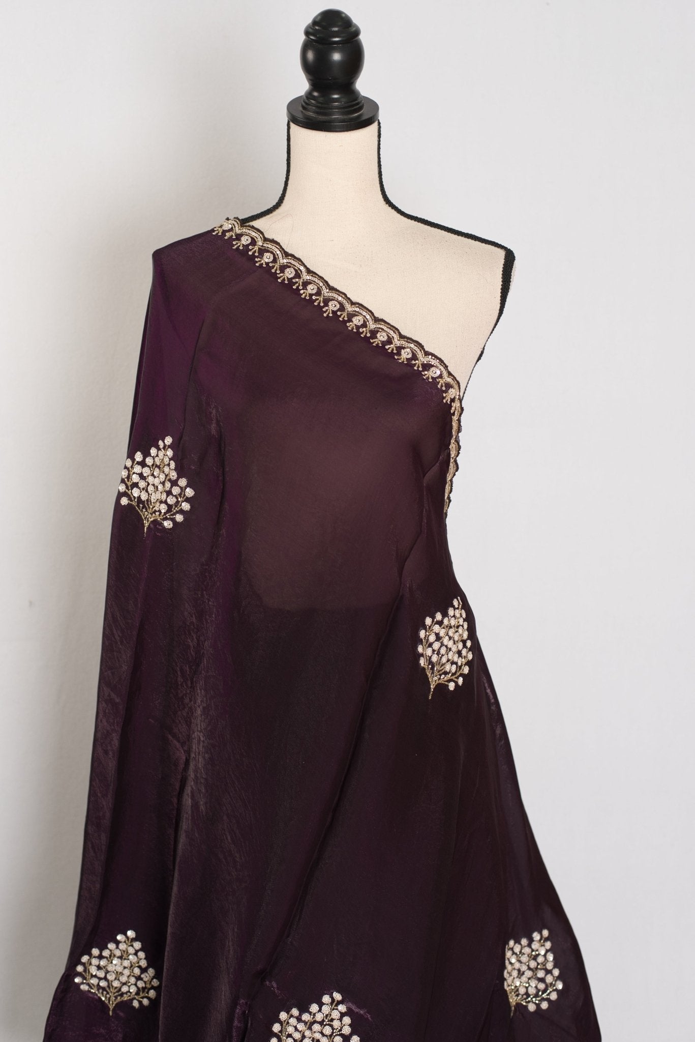 Rini: Deep Purple Glass Tissue Saree with Cut Dana Work | Partywear
