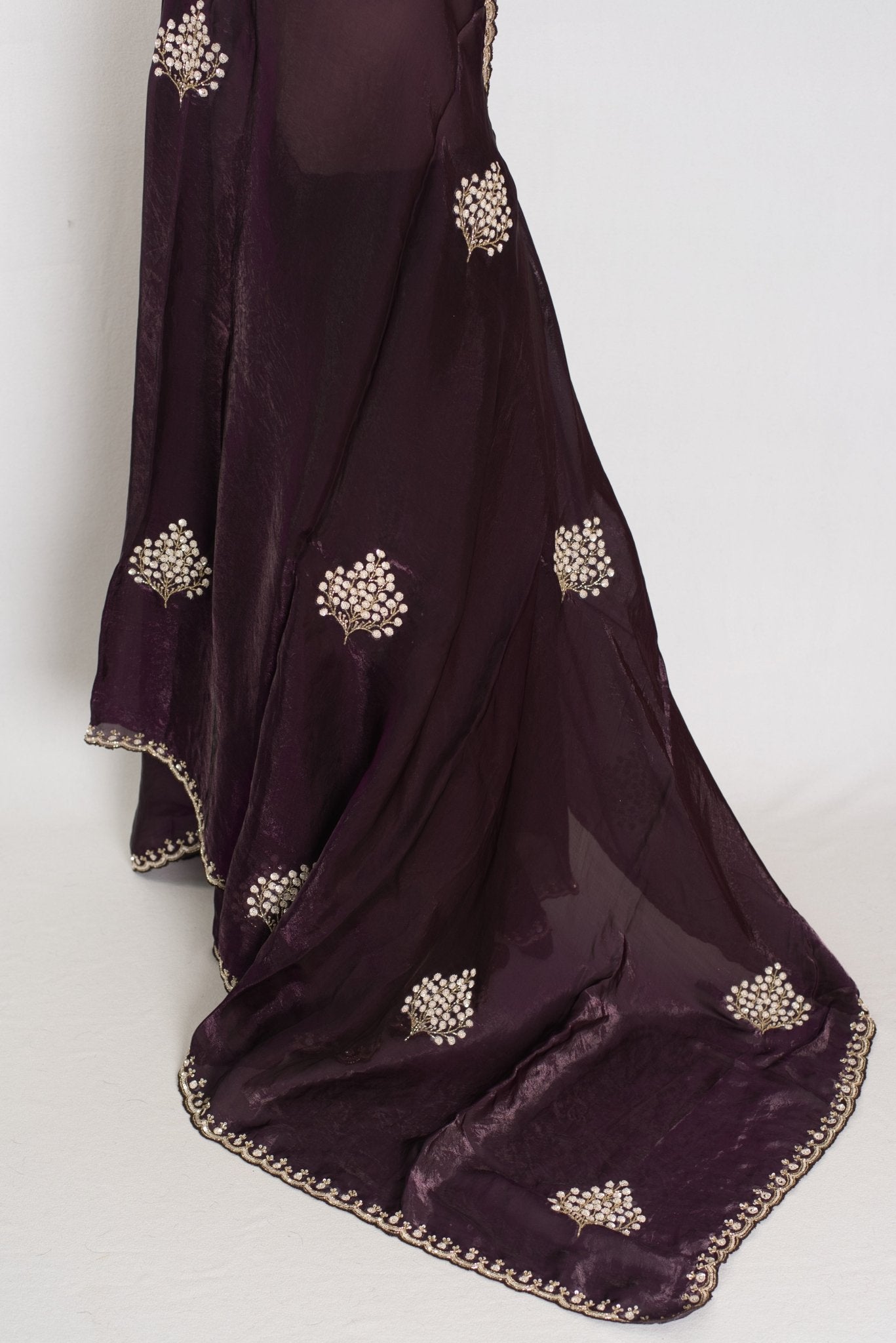 Rini: Deep Purple Glass Tissue Saree with Cut Dana Work | Partywear