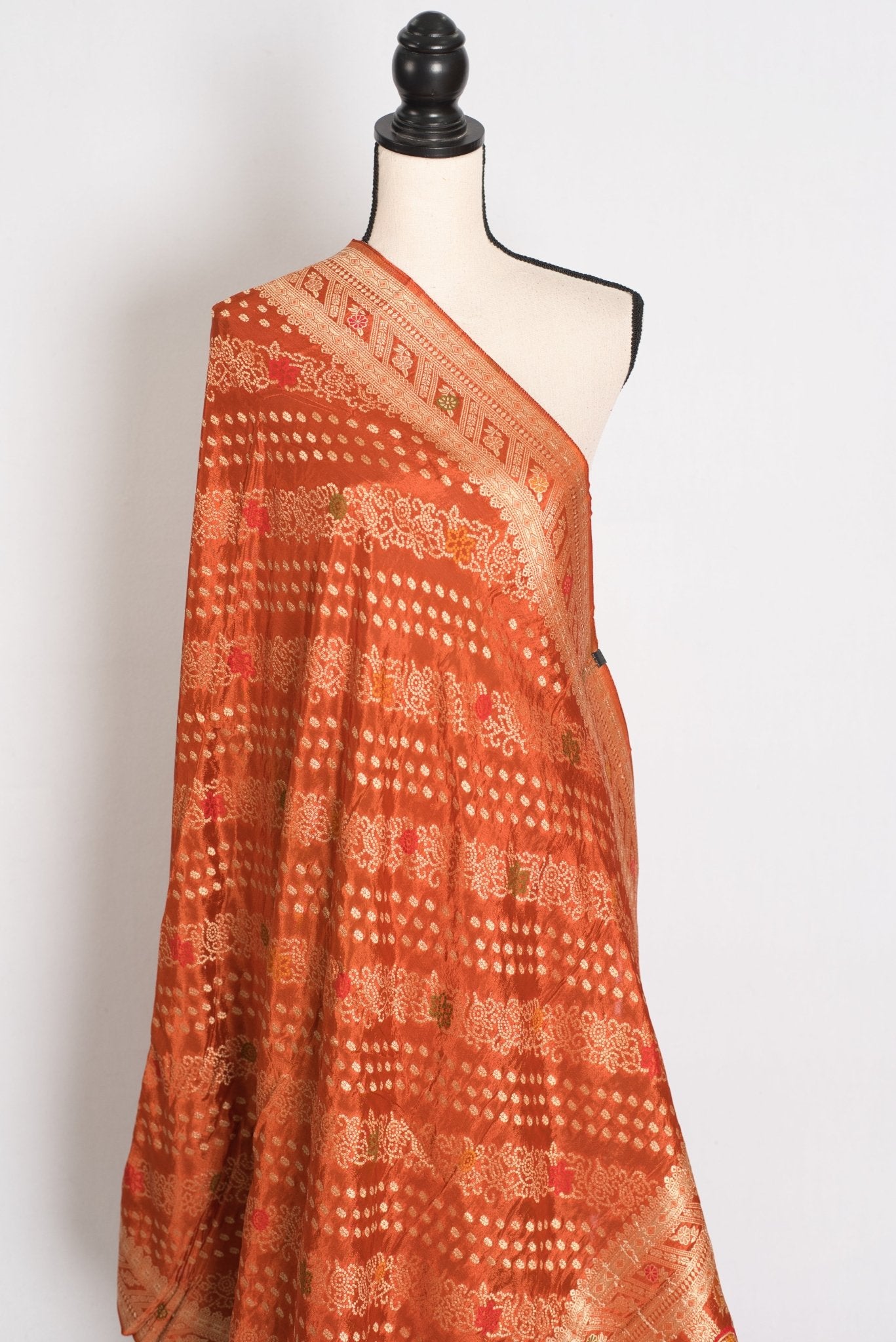 Sumi : Rust Orange & Gold Semi Mashru Bandhani Saree