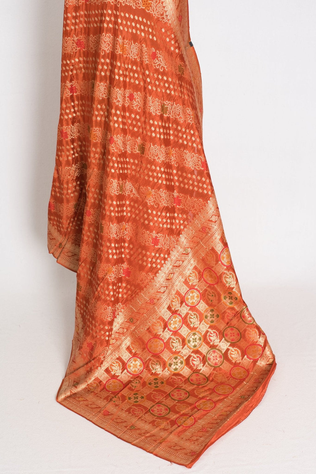 Sumi : Rust Orange & Gold Semi Mashru Bandhani Saree