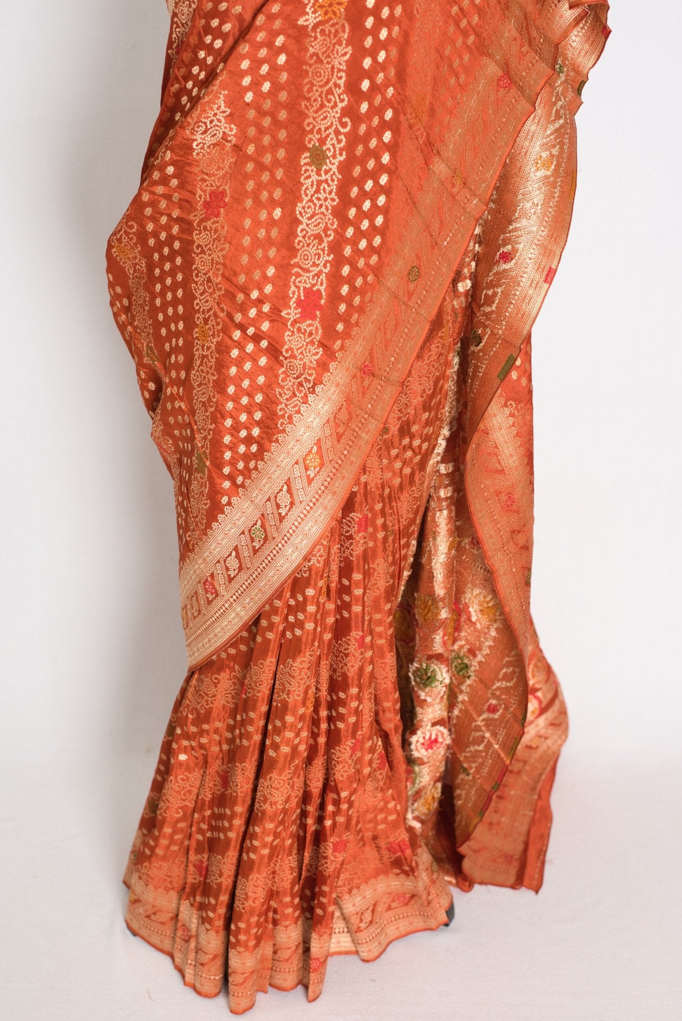 Sumi : Rust Orange & Gold Semi Mashru Bandhani Saree