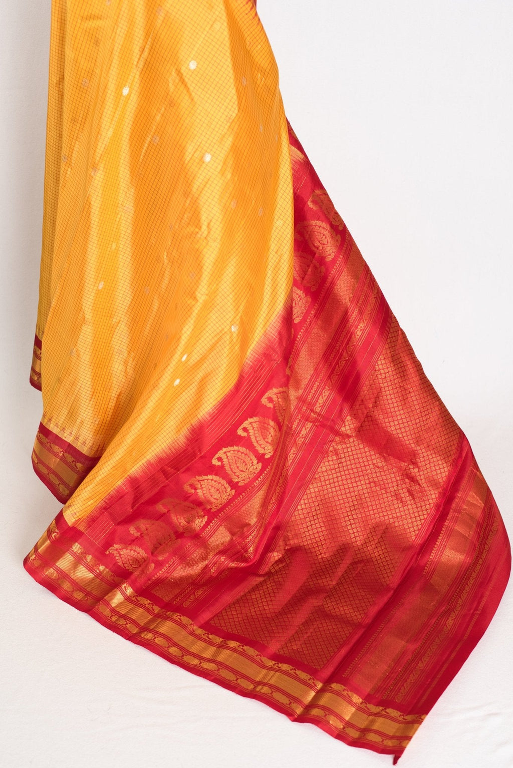 Vibha: Haldi Yellow and Red Checks Handwoven Gadwal Silk Saree with Golden Zari