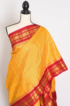 Vibha: Haldi Yellow and Red Checks Handwoven Gadwal Silk Saree with Golden Zari