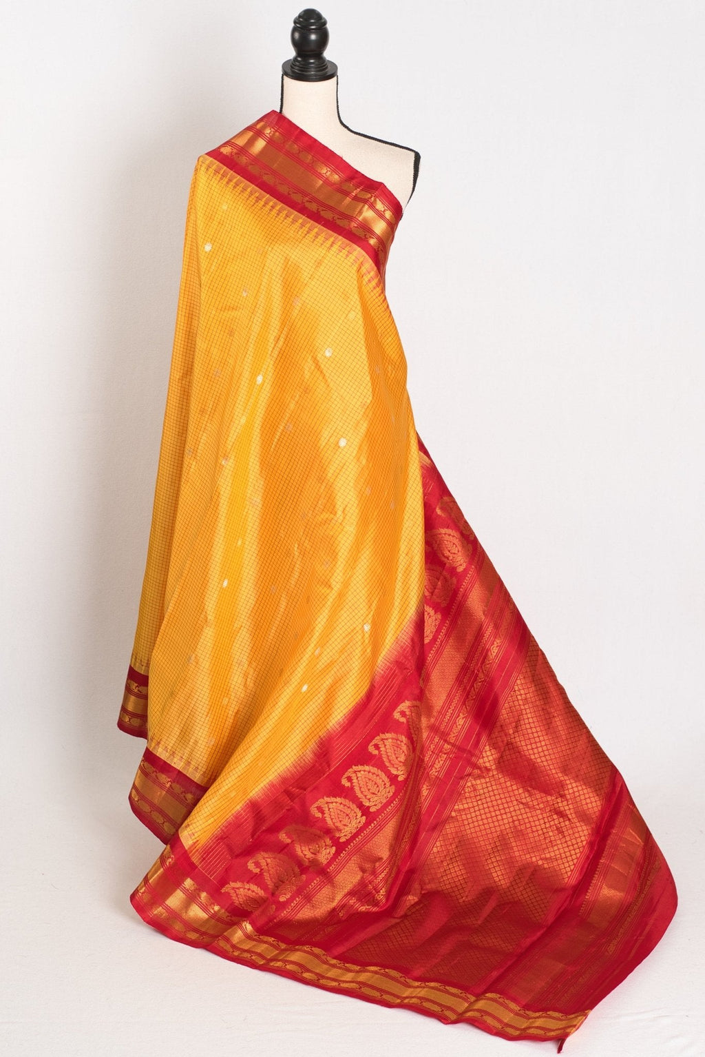 Vibha: Haldi Yellow and Red Checks Handwoven Gadwal Silk Saree with Golden Zari