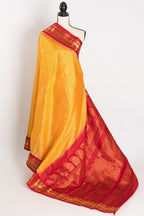 Vibha: Haldi Yellow and Red Checks Handwoven Gadwal Silk Saree with Golden Zari